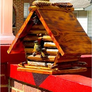 Large handcrafted birdhouse.